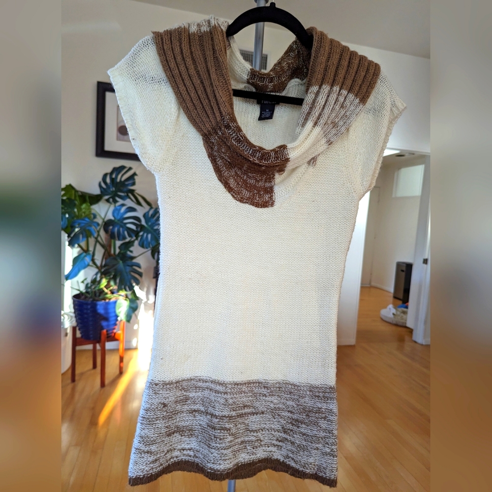 Light knit sleeveless sweater with cowl neck